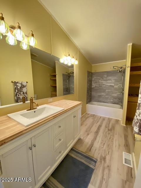 723 Finnie Flat Road, Unit 132 Camp Verde, AZ 86322 - Photo 34 of 58 a spacious bathroom with a sink and a mirror