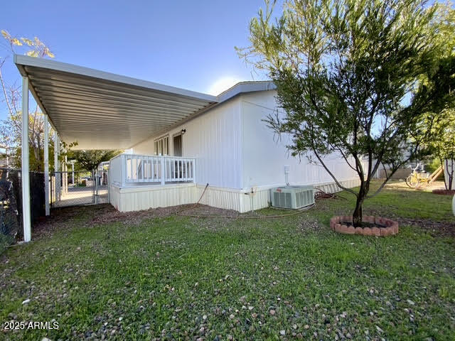 723 Finnie Flat Road, Unit 132 Camp Verde, AZ 86322 - Photo 54 of 58 a view of a house with backyard and garden