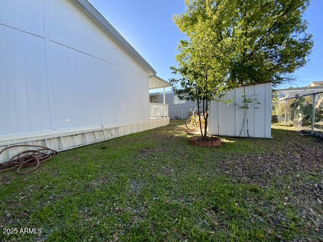 723 Finnie Flat Road, Unit 132 Camp Verde, AZ 86322 - Photo 55 of 58 a view of a backyard with large tree