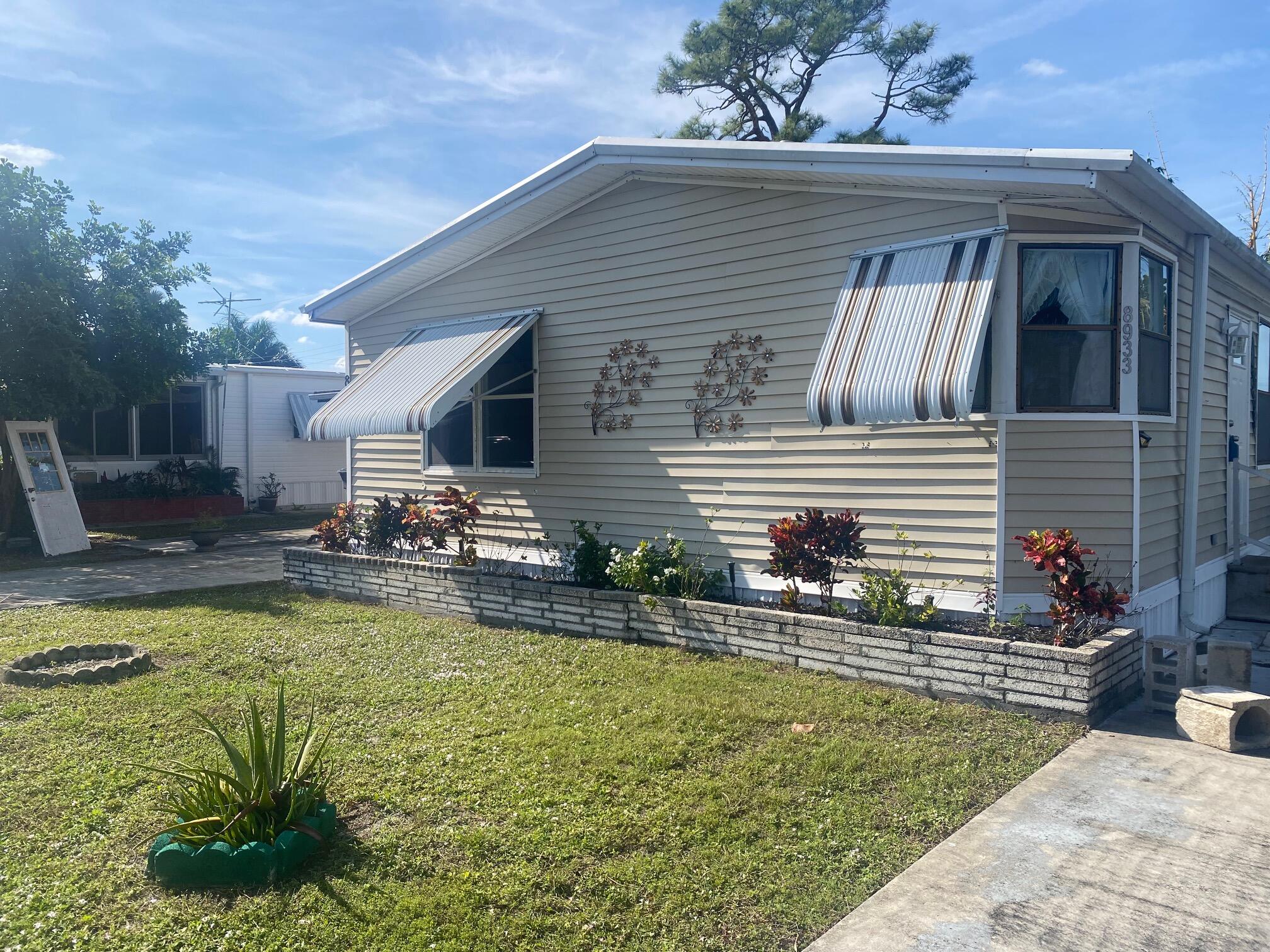 8933 Pine Street Boynton Beach, FL 33436 - Photo 1 of 16 Main house