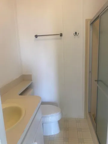 a bathroom with a sink and toilet