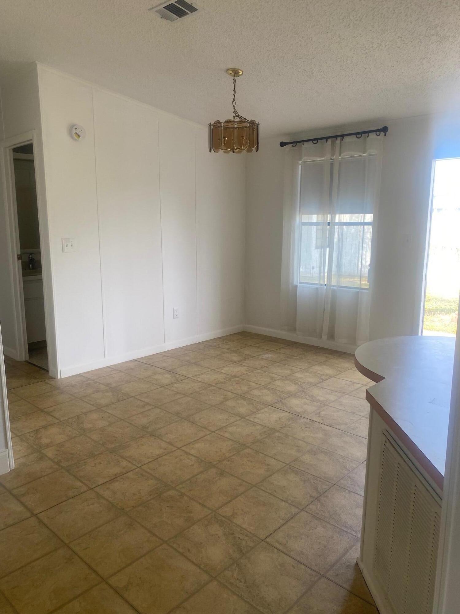 8933 Pine Street Boynton Beach, FL 33436 - Photo 6 of 16 Dining area