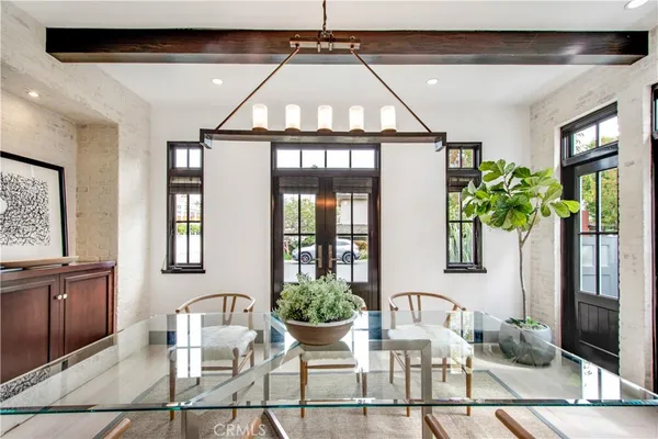 a bathroom with a sink a mirror and a shower
