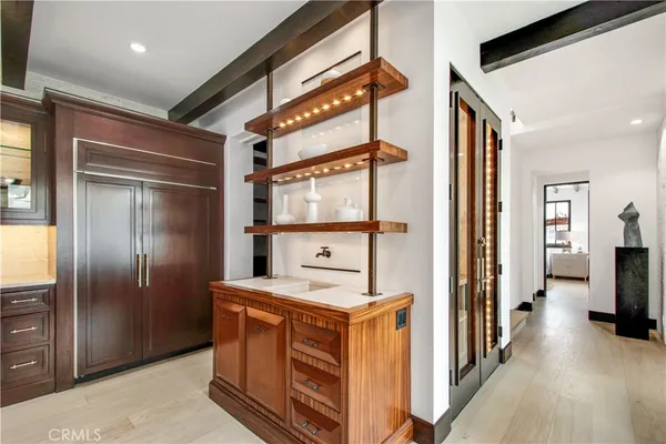 a bathroom with a sink a toilet a tub and shower