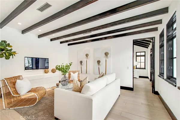 an aerial view of a houses with a lake view