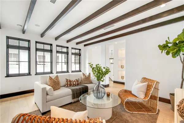 a view of a building with wooden floor and chair