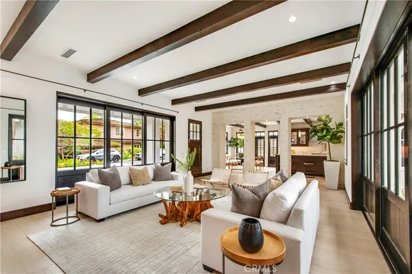 a kitchen with stainless steel appliances granite countertop a stove and a wooden cabinets