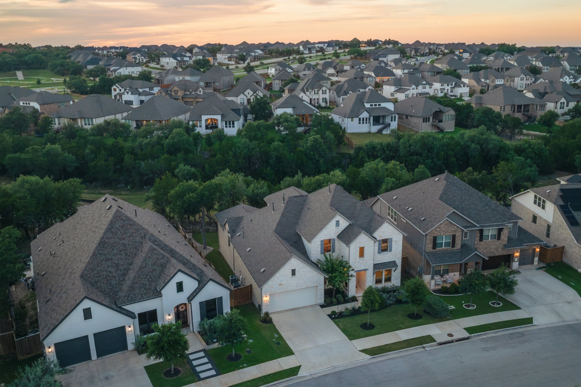 317 Autumn Oak Way Georgetown, TX 78628 - Photo 23 of 40 an aerial view of multiple houses with a city street