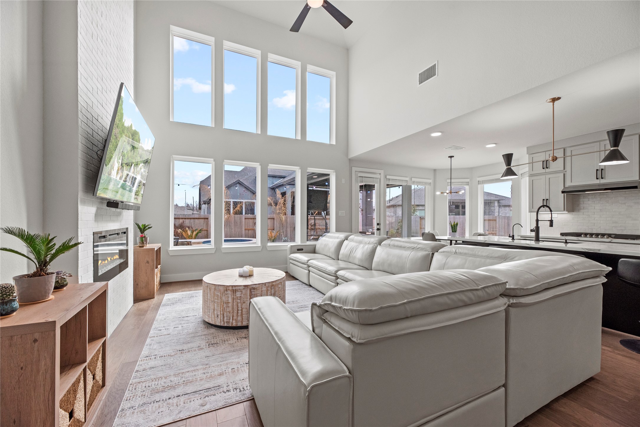 30155 GOLD FINCH Place Fulshear, TX 77441 - Photo 3 of 26 Now into the living space. High or intricately designed ceilings can draw the eye upward, adding a sense of grandeur and elegance to the room.