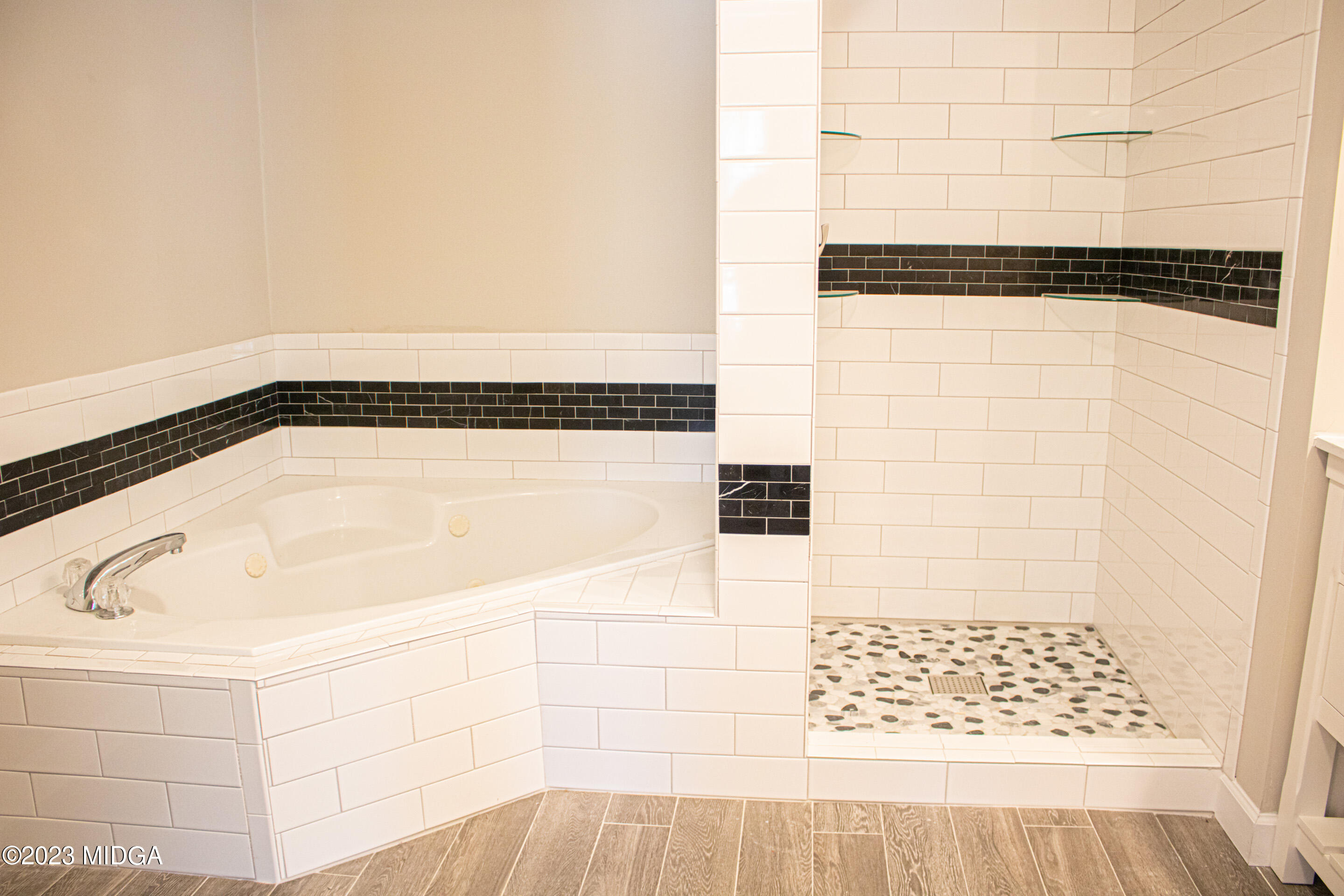 829 Lassiter Road Forsyth, GA 31029 - Photo 21 of 85 a bathroom with a shower
