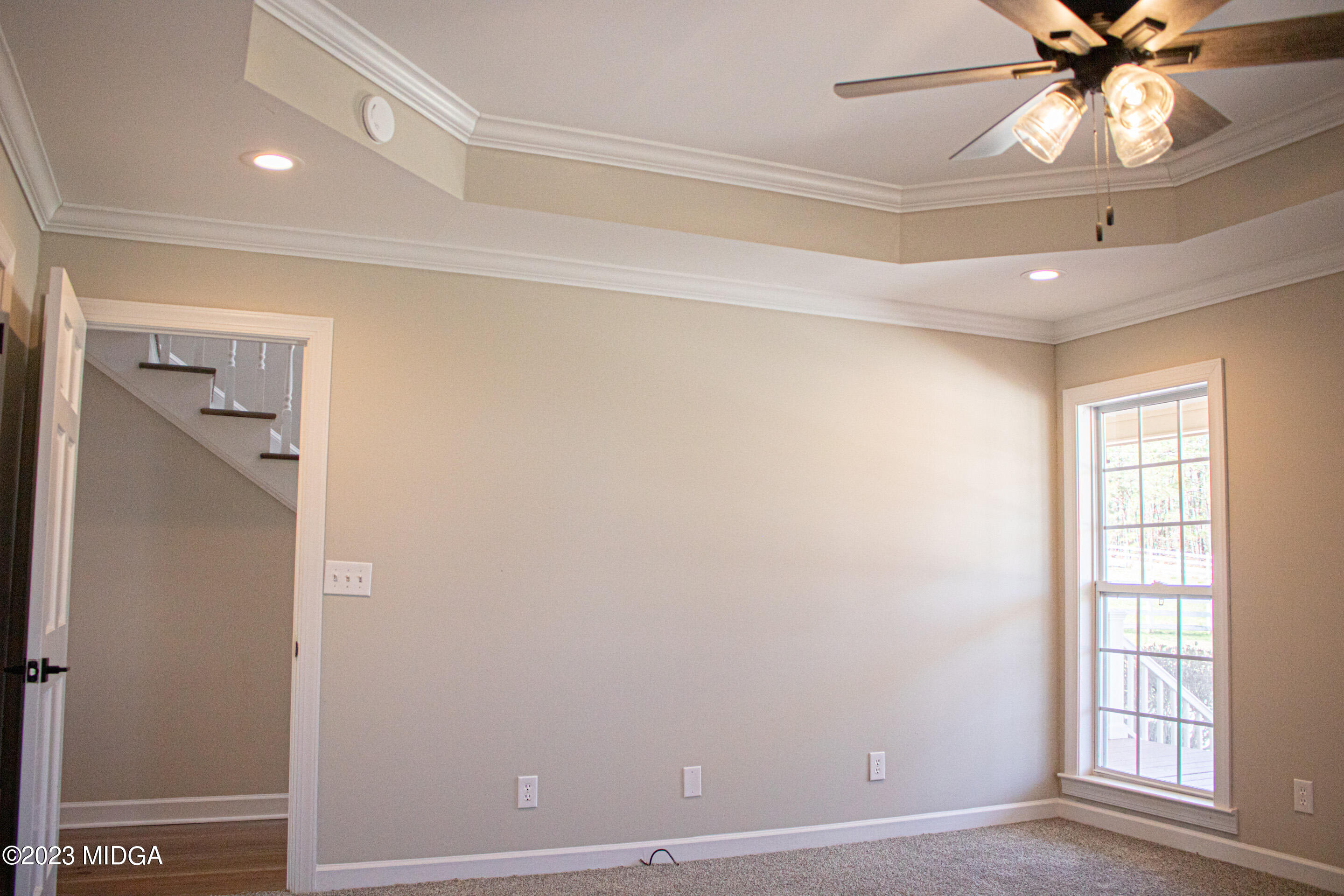 829 Lassiter Road Forsyth, GA 31029 - Photo 24 of 85 a view of an empty room with a window