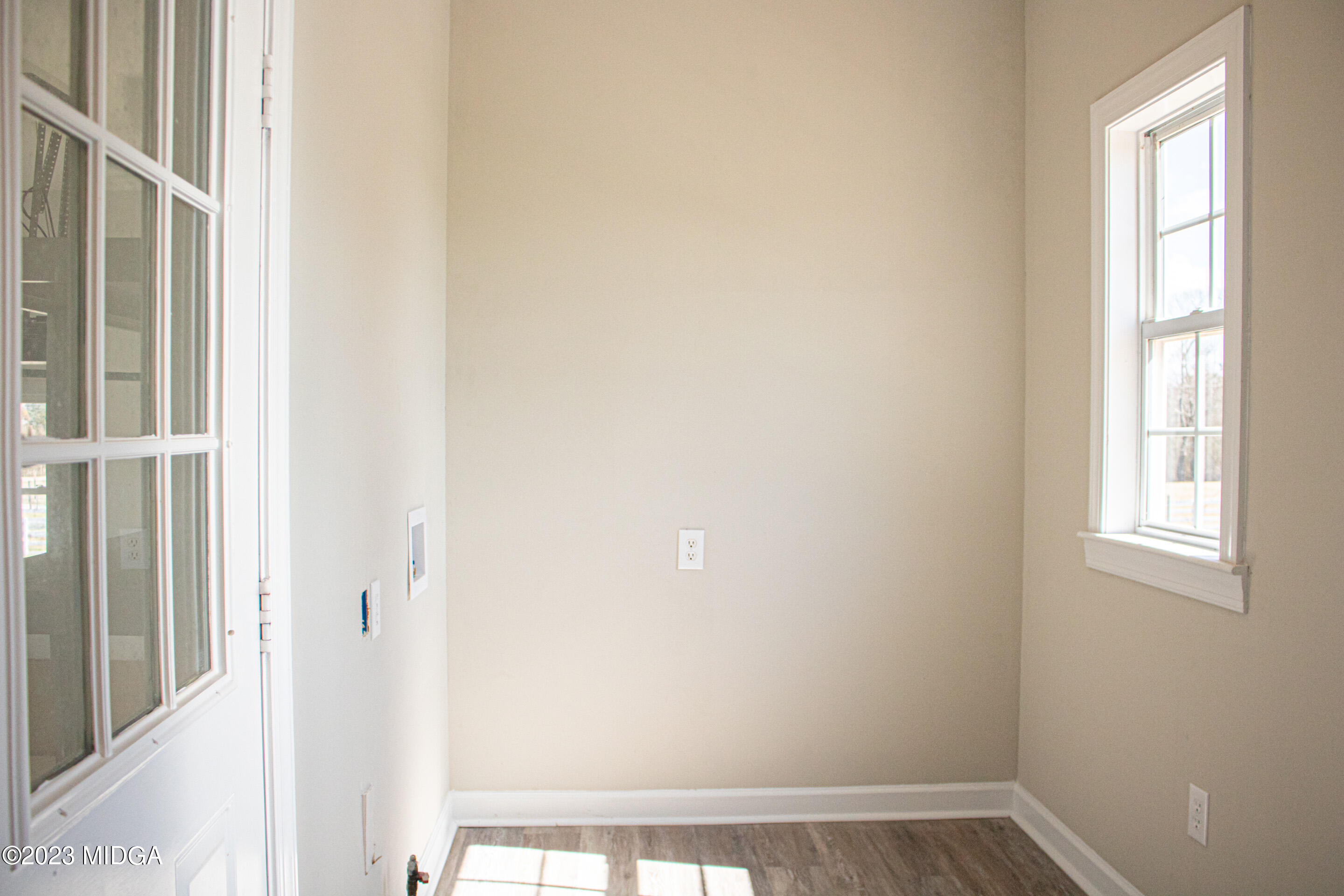 829 Lassiter Road Forsyth, GA 31029 - Photo 38 of 85 a view of an empty room with a window
