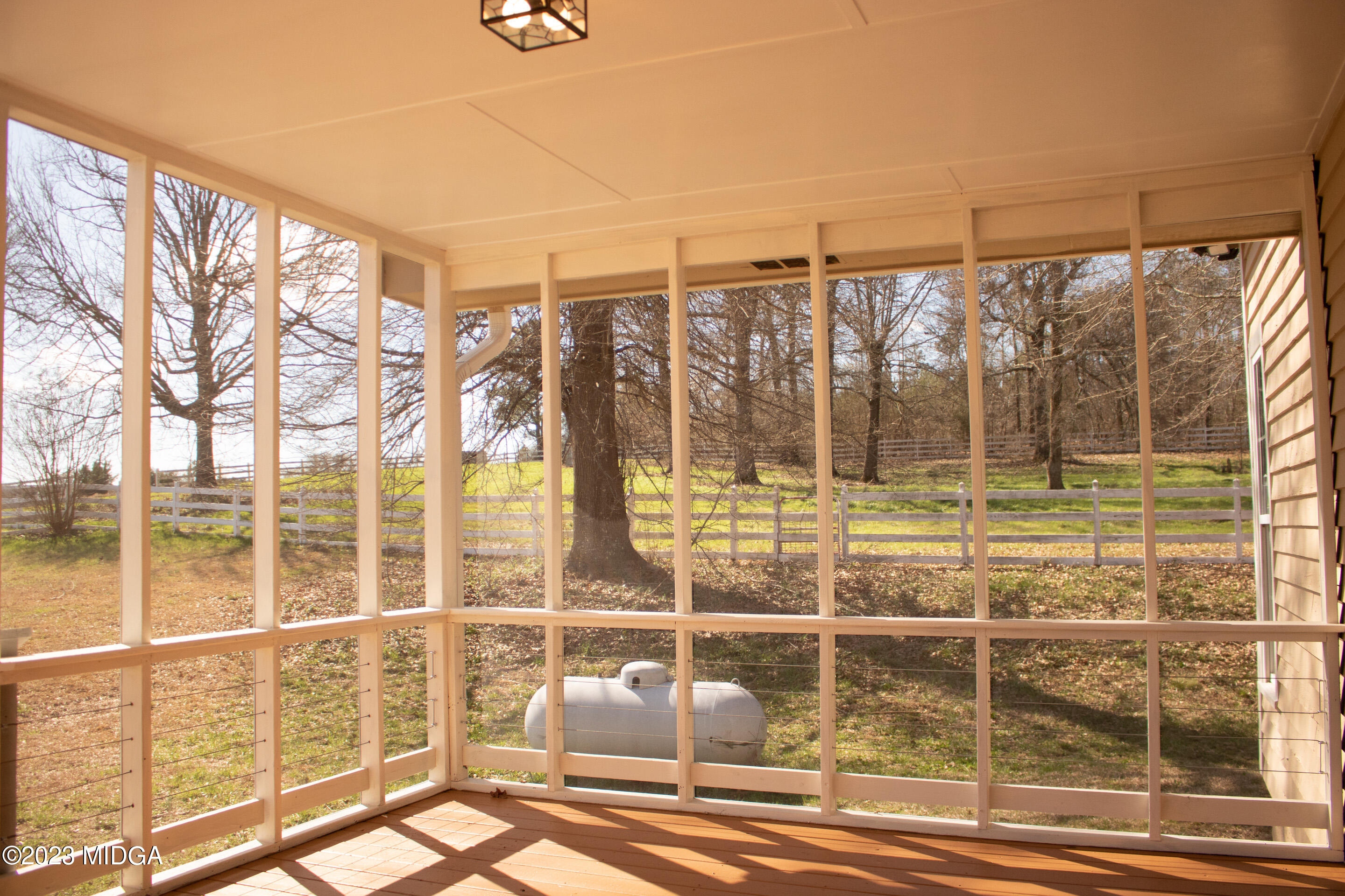829 Lassiter Road Forsyth, GA 31029 - Photo 42 of 85 a view of a balcony with a floor to ceiling windows