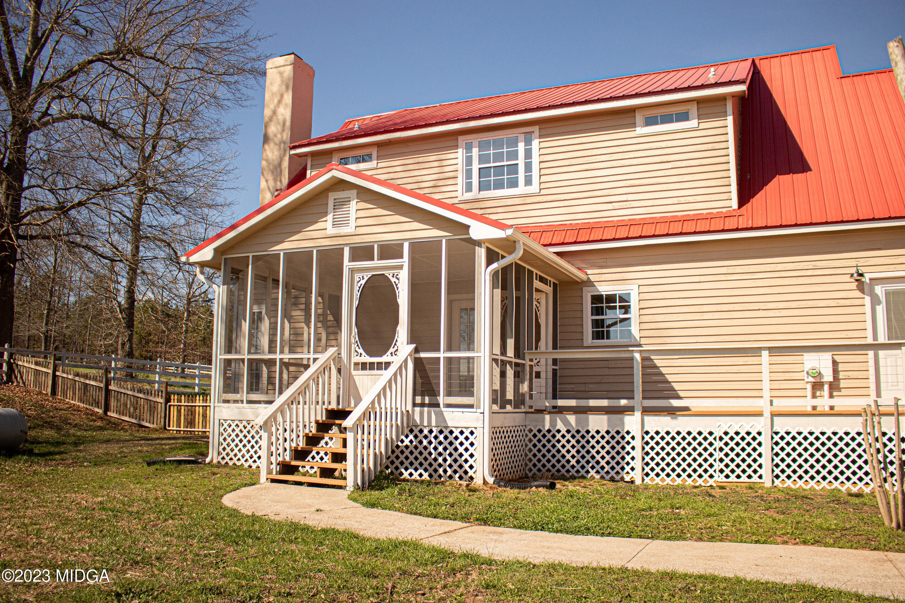 829 Lassiter Road Forsyth, GA 31029 - Photo 43 of 85 a front view of a house with a garden
