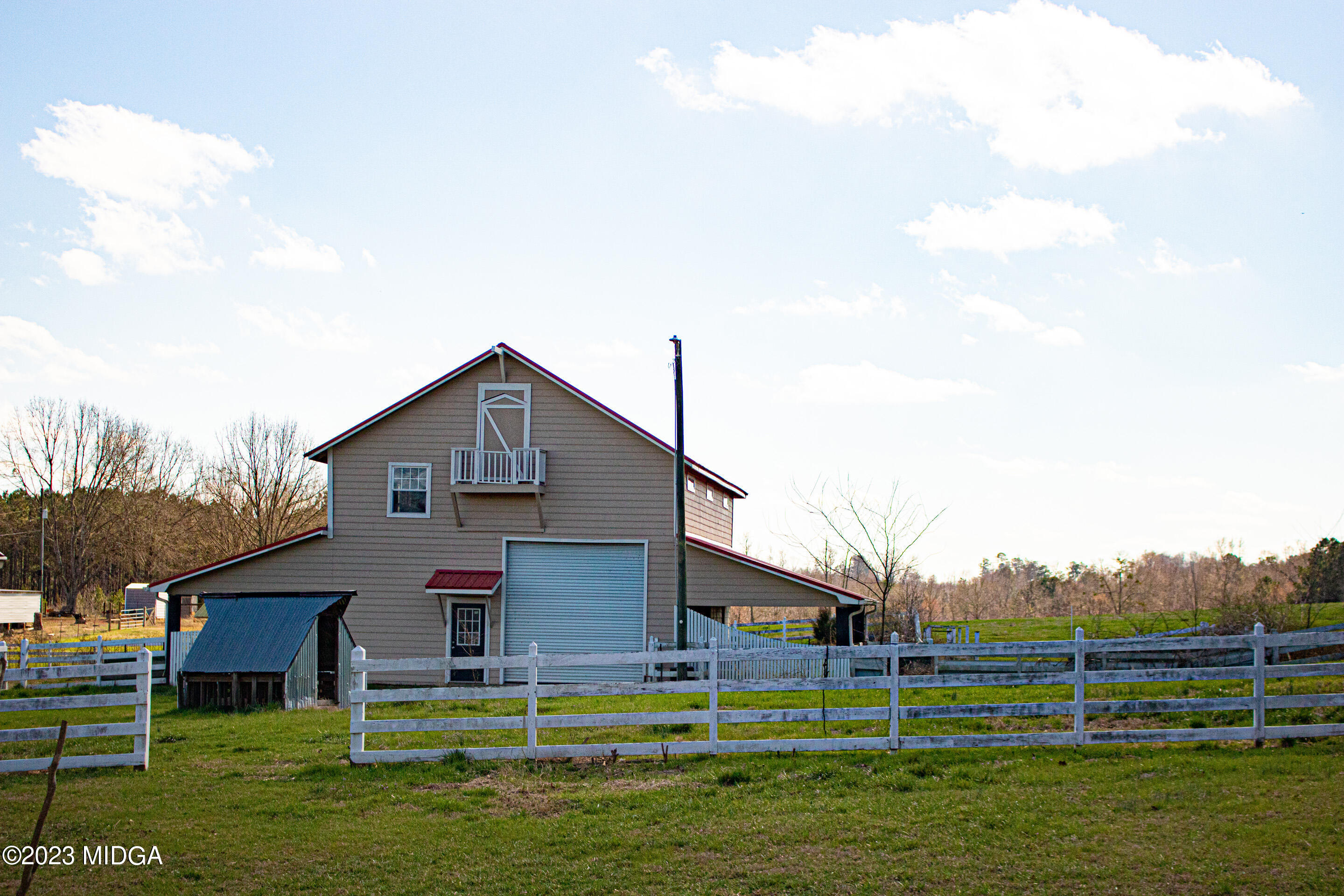 829 Lassiter Road Forsyth, GA 31029 - Photo 44 of 85 a view of house with a big yard