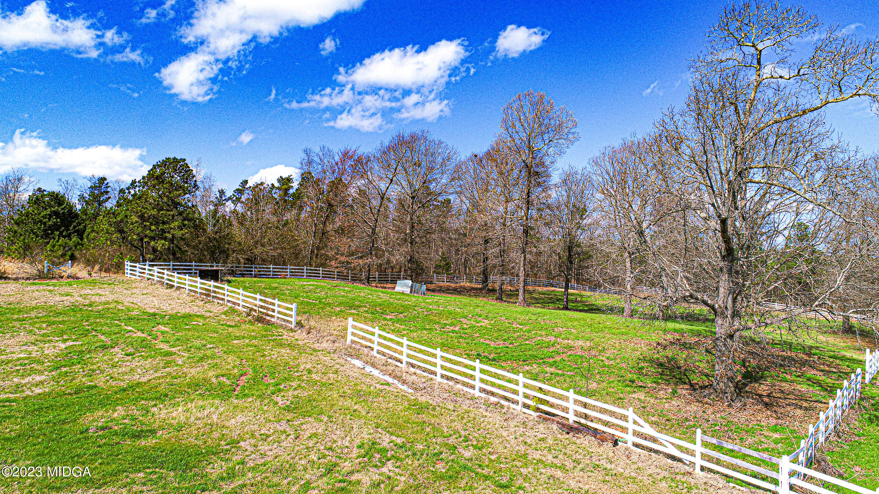 829 Lassiter Road Forsyth, GA 31029 - Photo 80 of 85 a view of a yard with a house