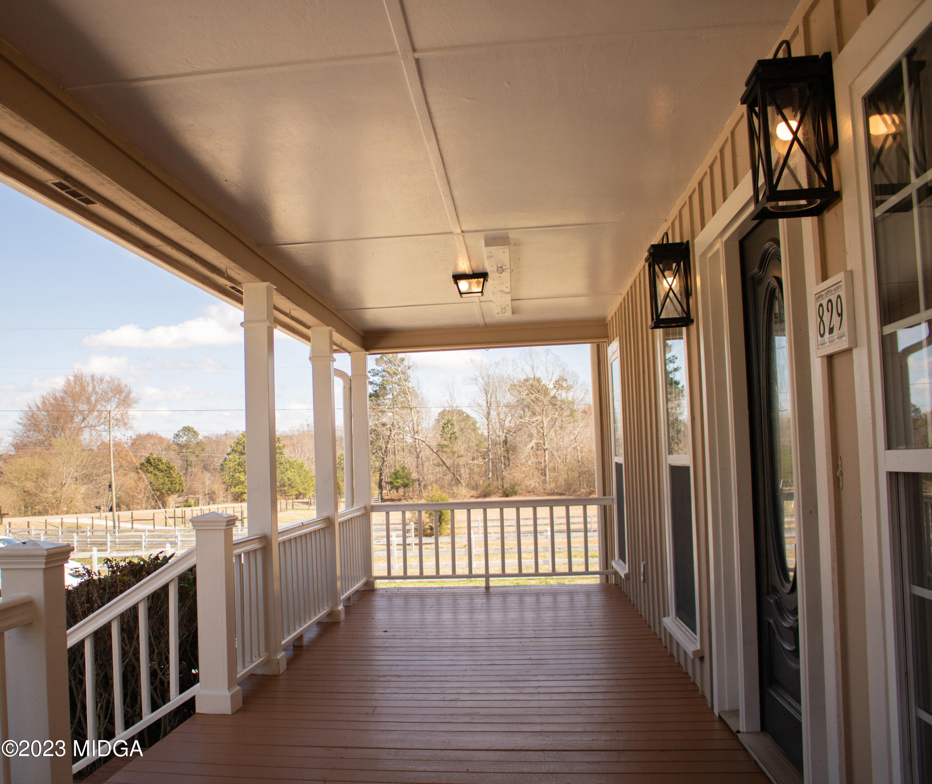 829 Lassiter Road Forsyth, GA 31029 - Photo 8 of 85 a view of a city from the stairs