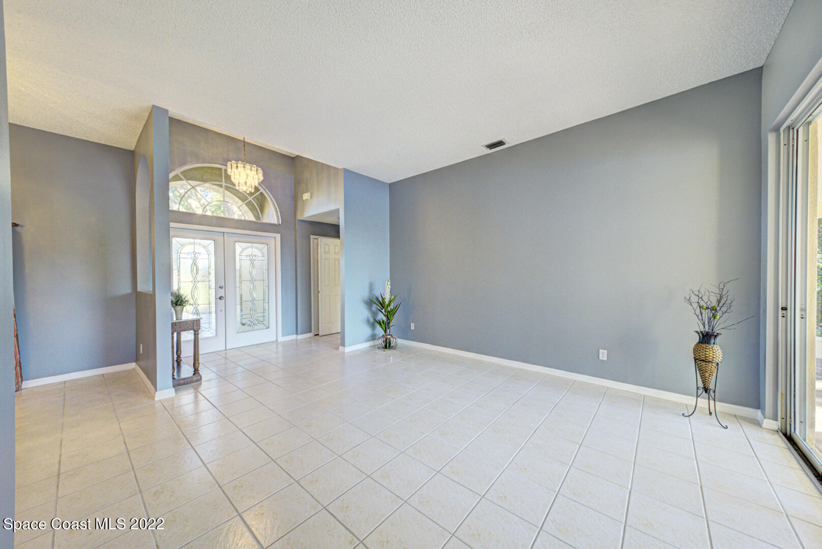 1241 Winding Meadows Road Rockledge, FL 32955 - Photo 14 of 54 living room & foyer