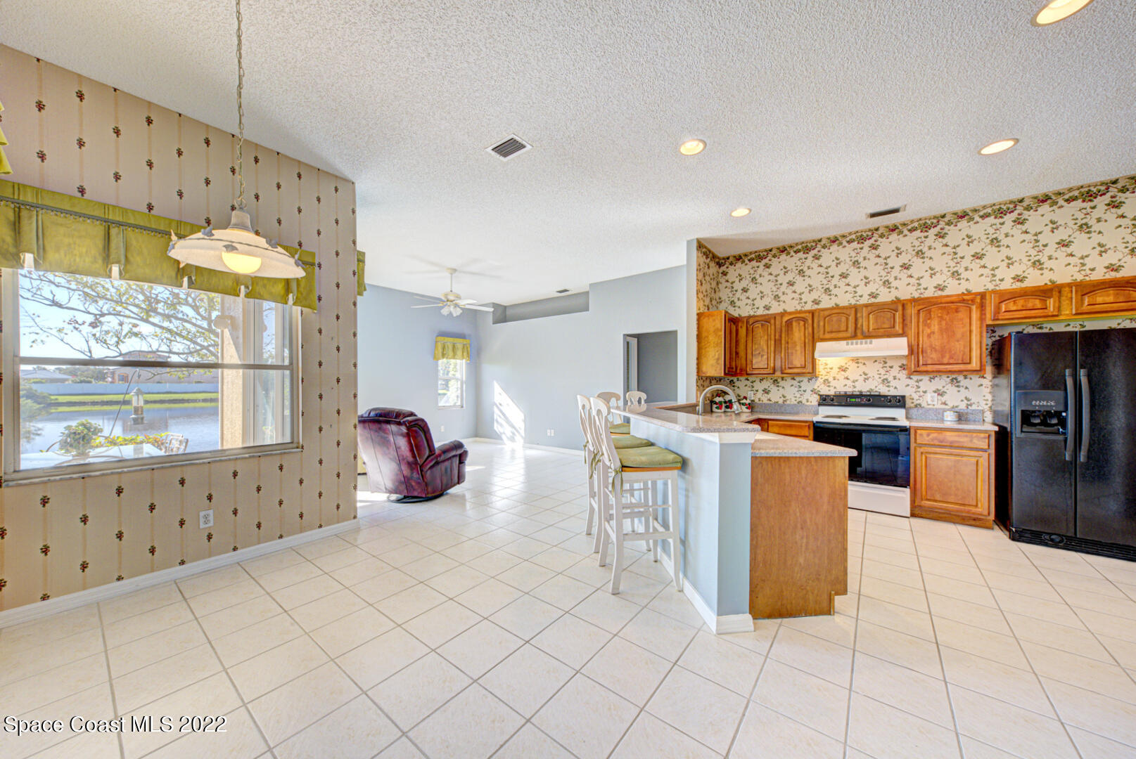1241 Winding Meadows Road Rockledge, FL 32955 - Photo 21 of 54 breakfast nook & kitchen