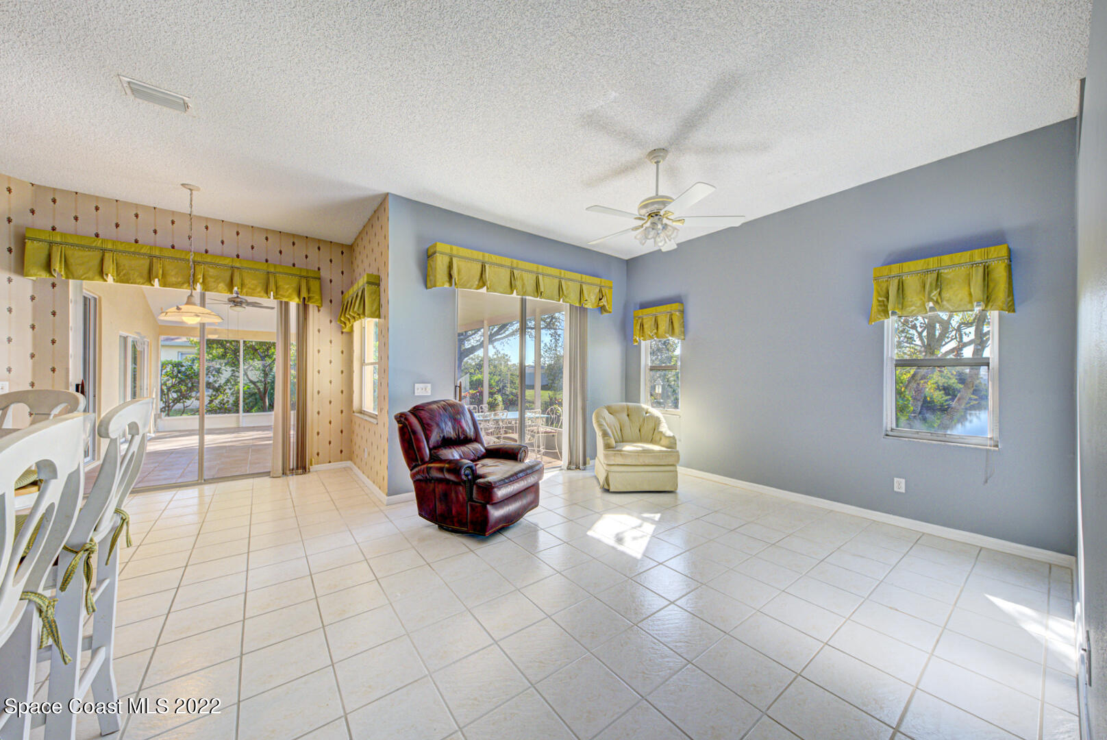 1241 Winding Meadows Road Rockledge, FL 32955 - Photo 24 of 54 family room & breakfast nook
