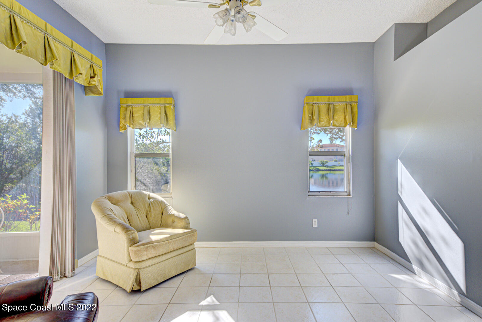 1241 Winding Meadows Road Rockledge, FL 32955 - Photo 26 of 54 family room with water views