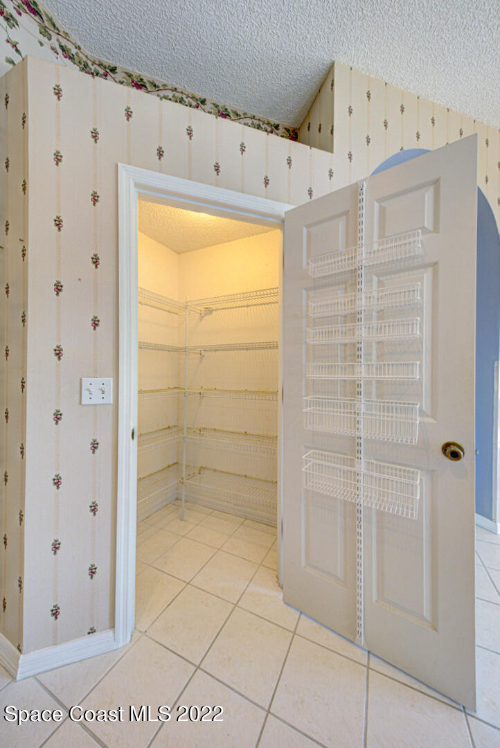 1241 Winding Meadows Road Rockledge, FL 32955 - Photo 32 of 54 kitchen pantry