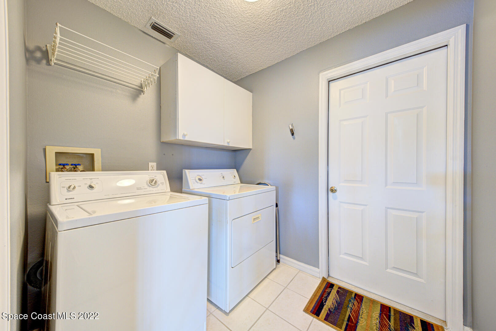1241 Winding Meadows Road Rockledge, FL 32955 - Photo 33 of 54 laundry room