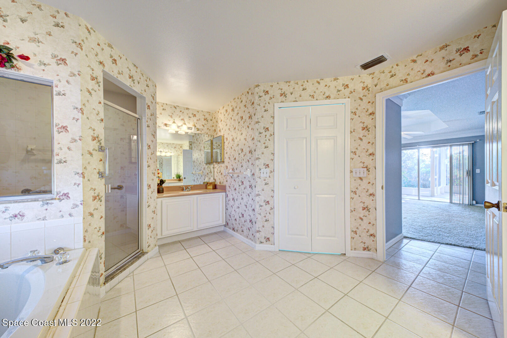 1241 Winding Meadows Road Rockledge, FL 32955 - Photo 40 of 54 master bathroom with tile floor