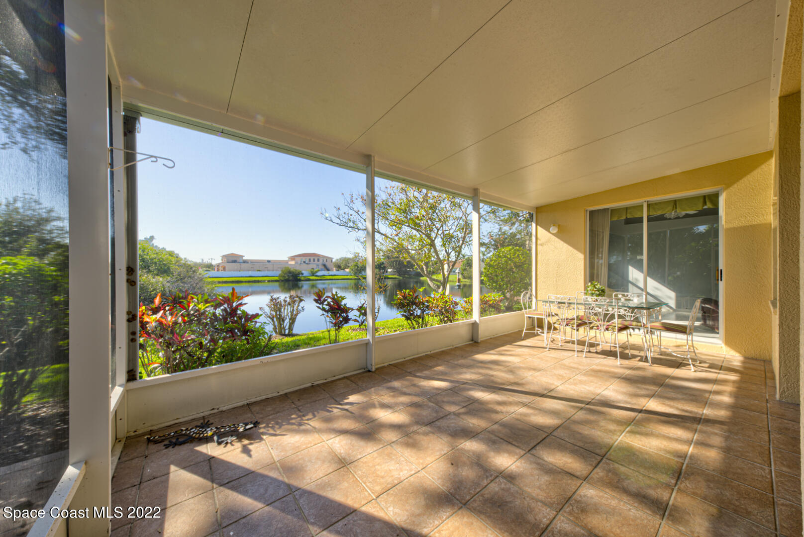 1241 Winding Meadows Road Rockledge, FL 32955 - Photo 50 of 54 screened-in back porch with water views