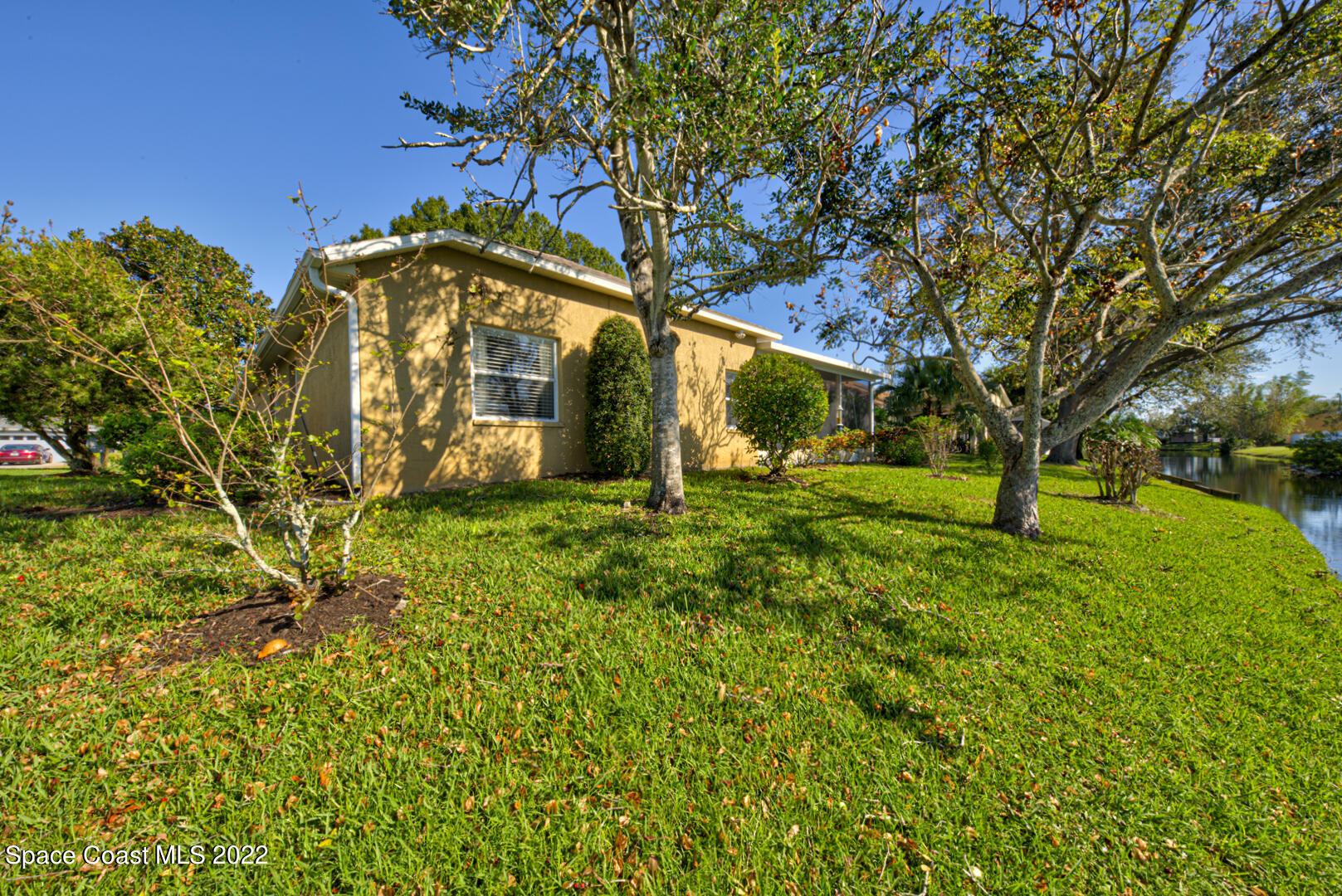1241 Winding Meadows Road Rockledge, FL 32955 - Photo 52 of 54 back of house left