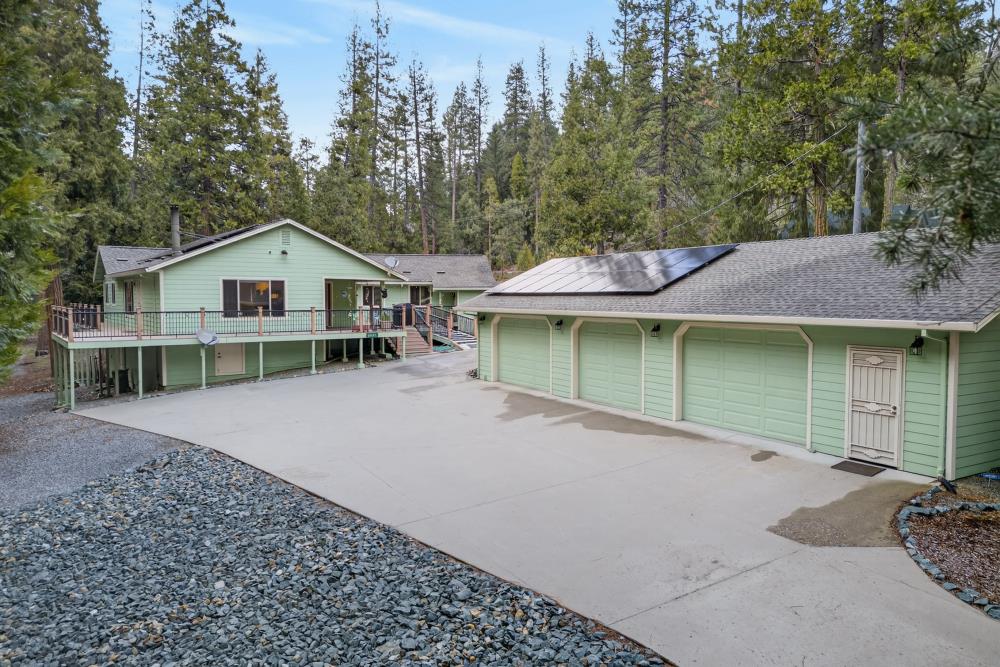2026 Lily Valley Way West Point, CA 95255 - Photo 1 of 39 a front view of a house with a garden and yard