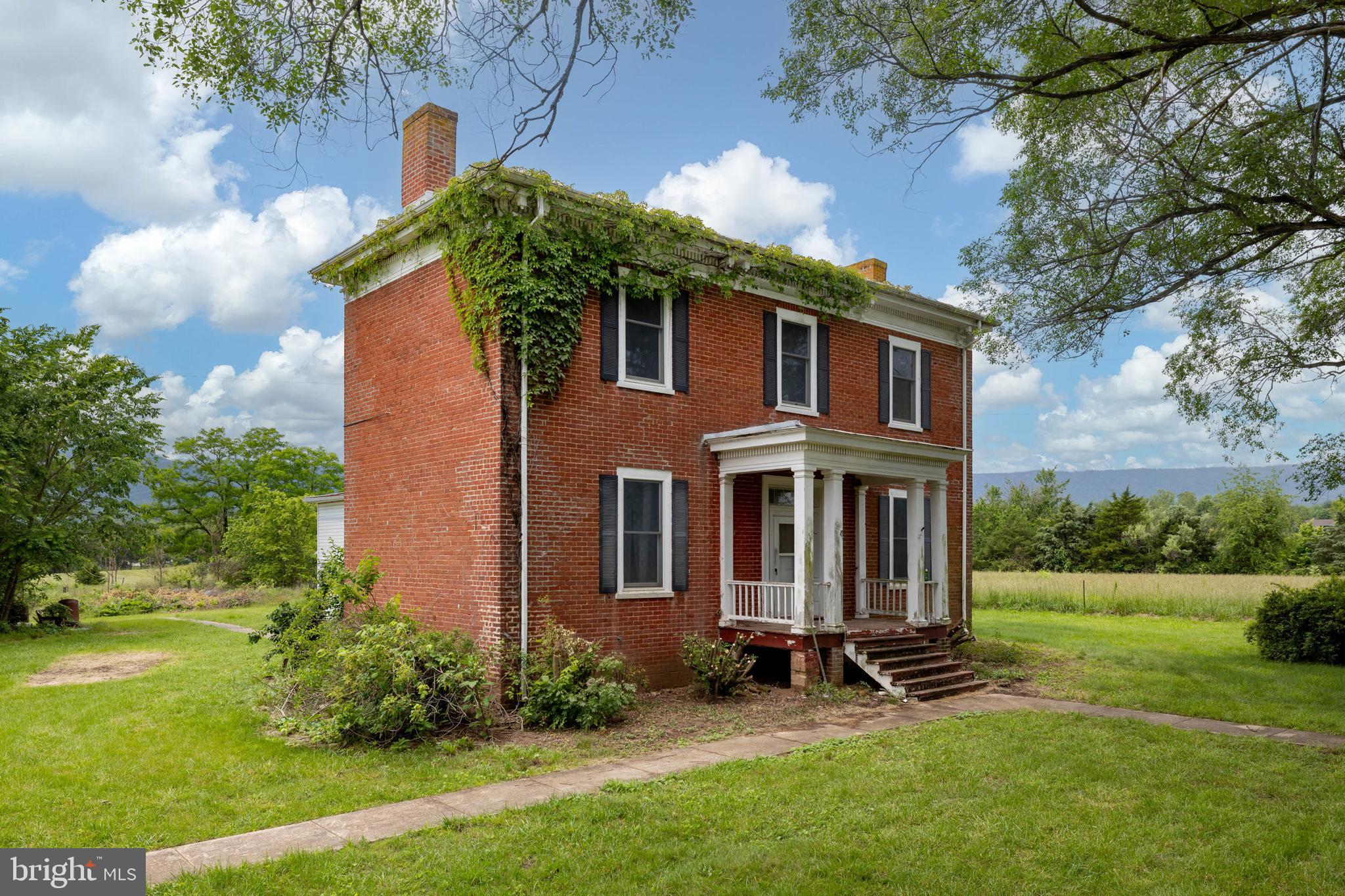 501 South Fork Road Luray, VA 22835 - Photo 1 of 79 a front view of a house with garden
