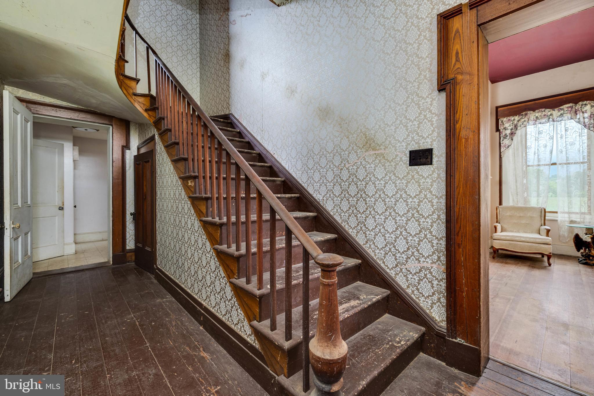 501 South Fork Road Luray, VA 22835 - Photo 12 of 79 a view of staircase with railing and white walls