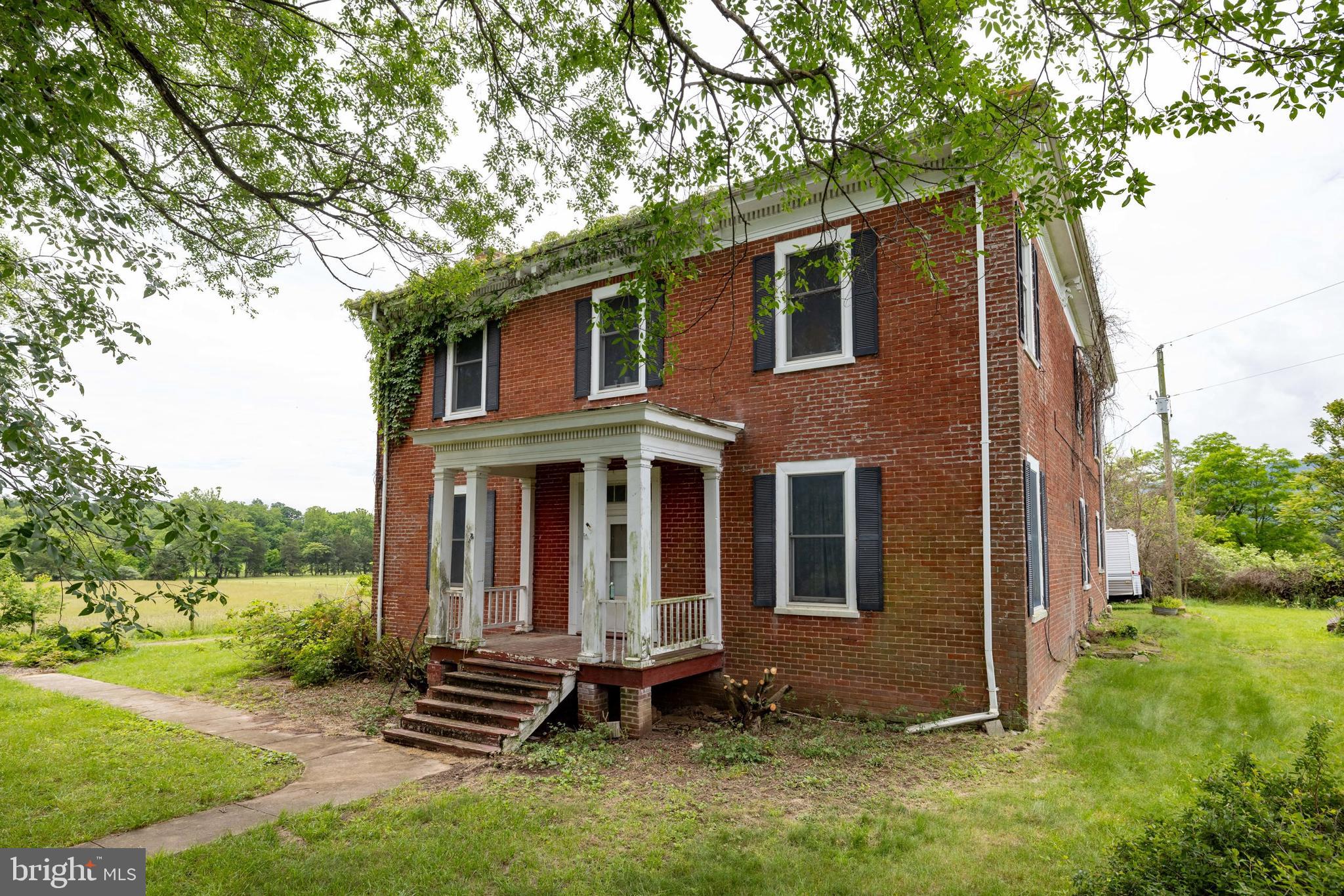 501 South Fork Road Luray, VA 22835 - Photo 40 of 79 a backyard of a house with lots of green space