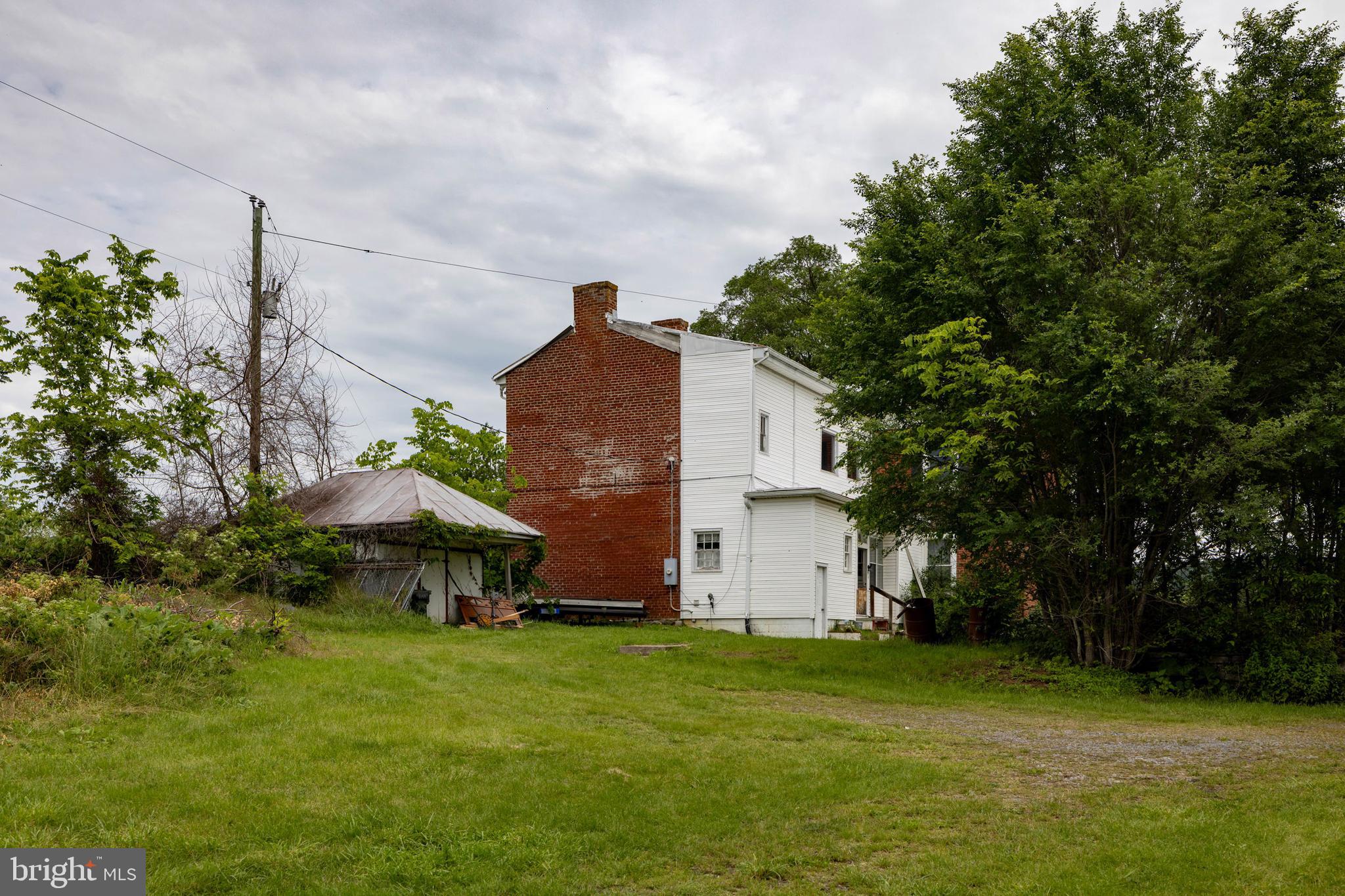 501 South Fork Road Luray, VA 22835 - Photo 50 of 79 a front view of house with yard and trees