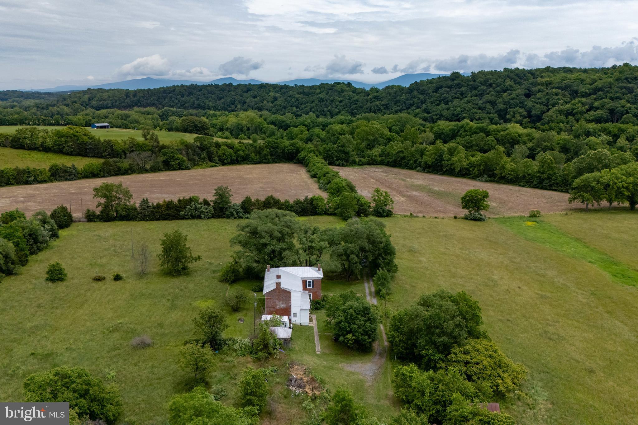 501 South Fork Road Luray, VA 22835 - Photo 60 of 79 an aerial view of a houses with outdoor space and a lake view