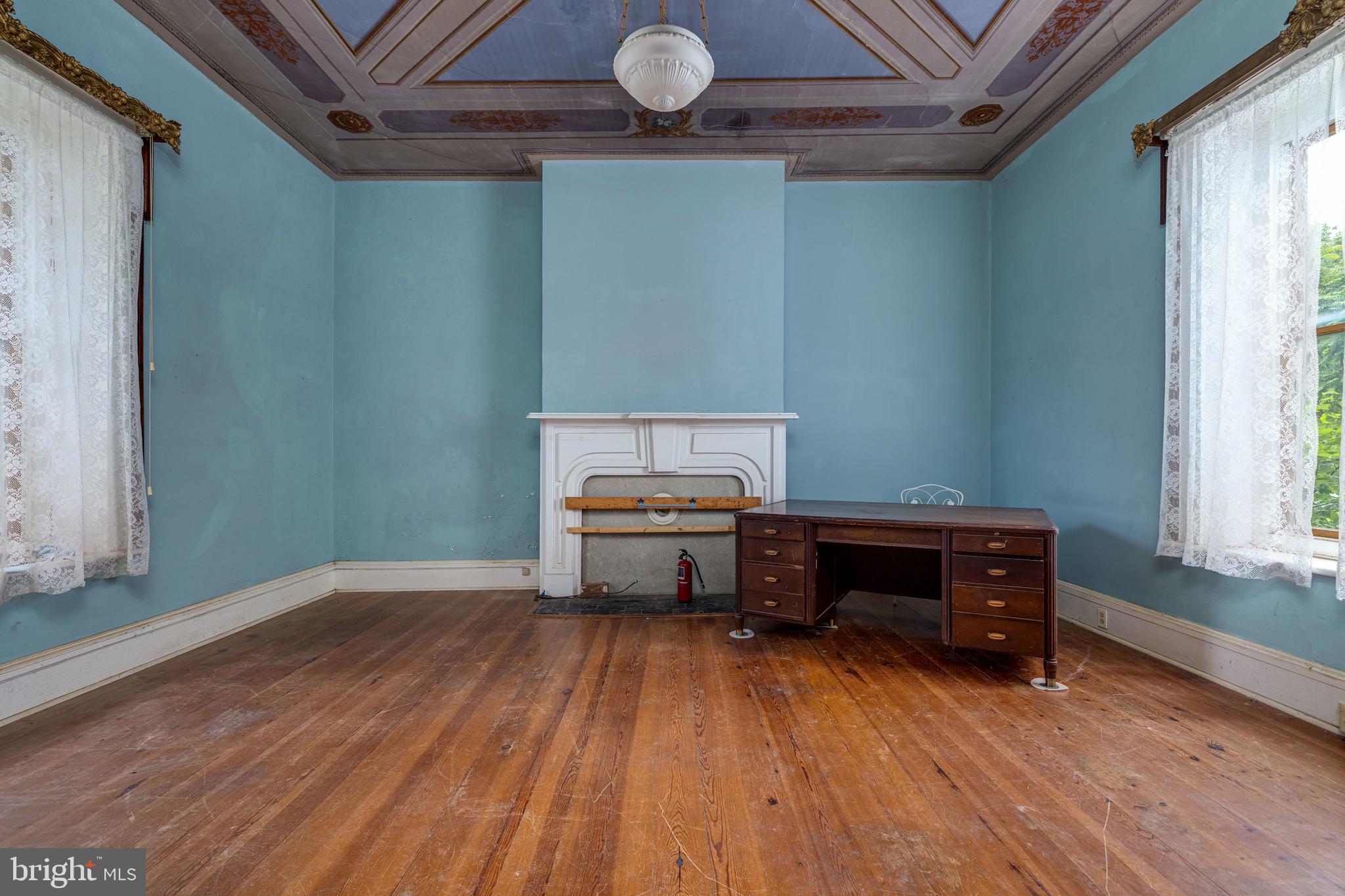 501 South Fork Road Luray, VA 22835 - Photo 8 of 79 a room with a wooden floor and furniture