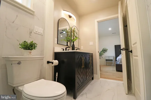 a kitchen with a refrigerator and a sink