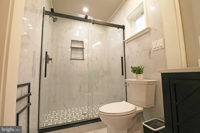 a view of a brick house with a large window