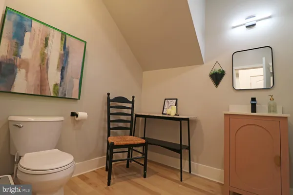 a view of a brick house with a large window