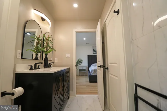 a front view of house with yard outdoor seating and barbeque oven