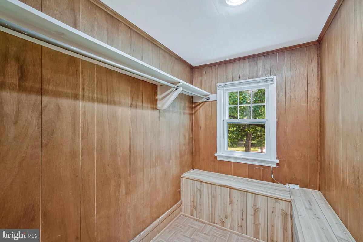 9425 Washington Boulevard Lanham, MD 20706 - Photo 27 of 38 a view of a door and wooden floor in a room