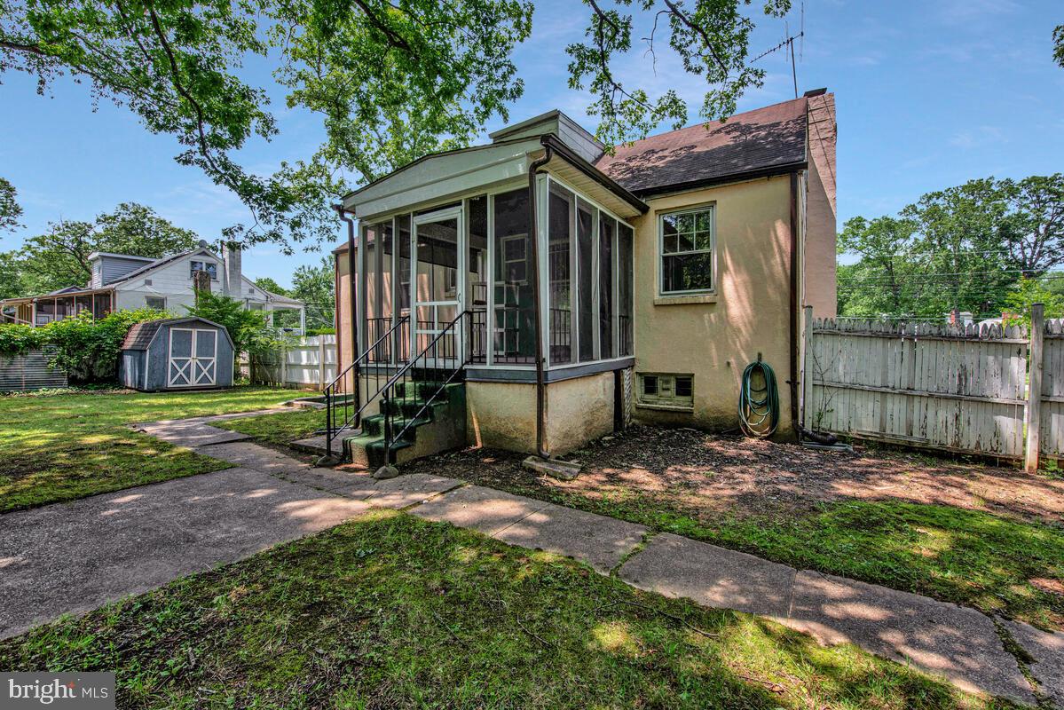 9425 Washington Boulevard Lanham, MD 20706 - Photo 36 of 38 a view of a backyard with a small cabin