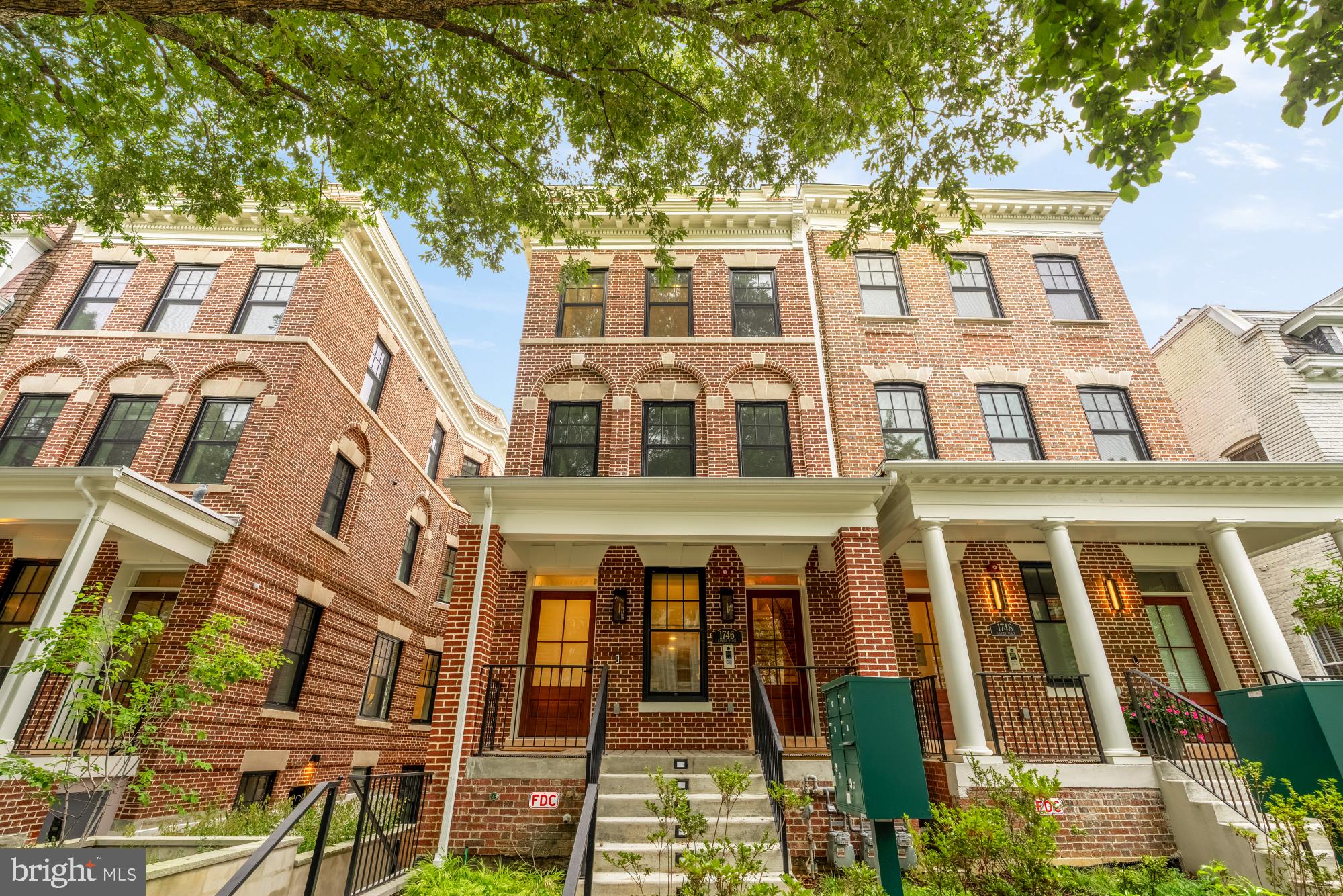 a front view of a multi story residential apartment building