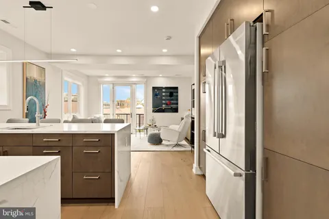 a bathroom with a sink a mirror and a shower