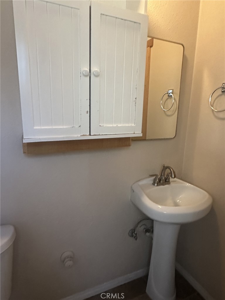 29135 Hook Creek Road Cedar Glen, CA 92321 - Photo 9 of 17 a bathroom with a sink and a toilet