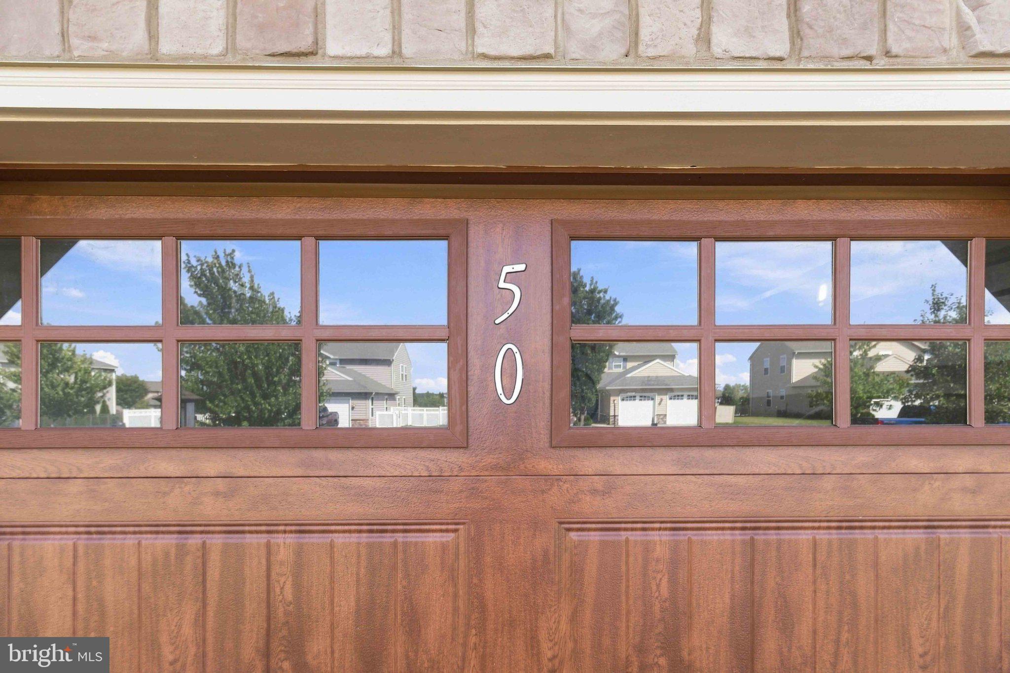 Charming garage door with character.