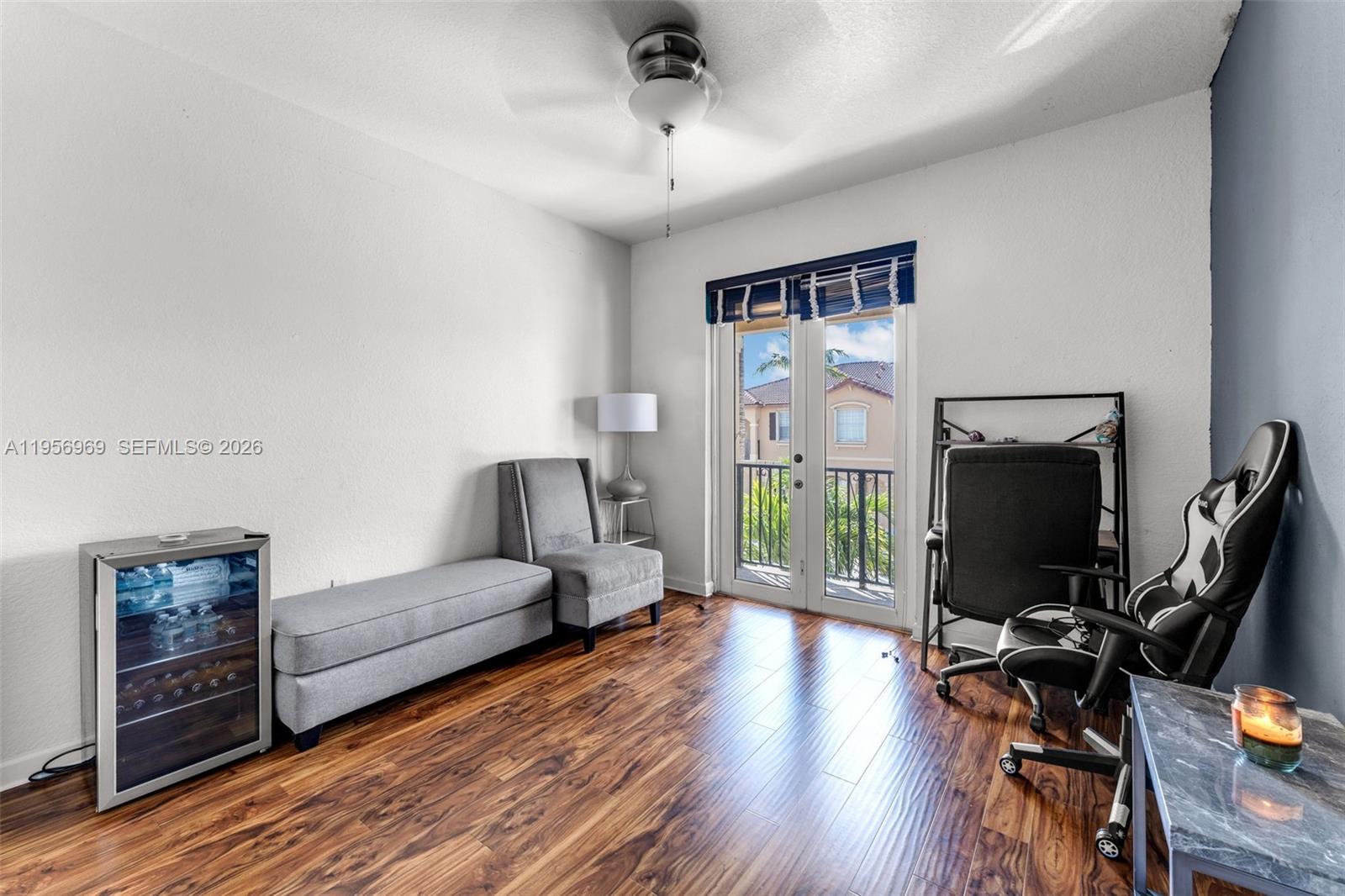 12965 Southwest 133rd Terrace Miami, FL 33186 - Photo 15 of 42 a bedroom with furniture and a window