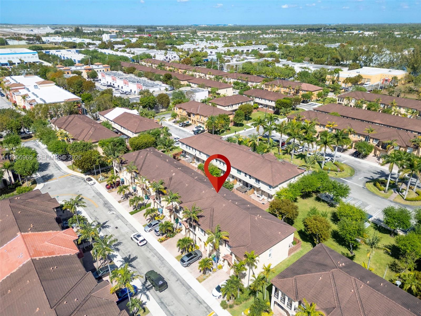 12965 Southwest 133rd Terrace Miami, FL 33186 - Photo 35 of 42 an aerial view of residential houses with outdoor space