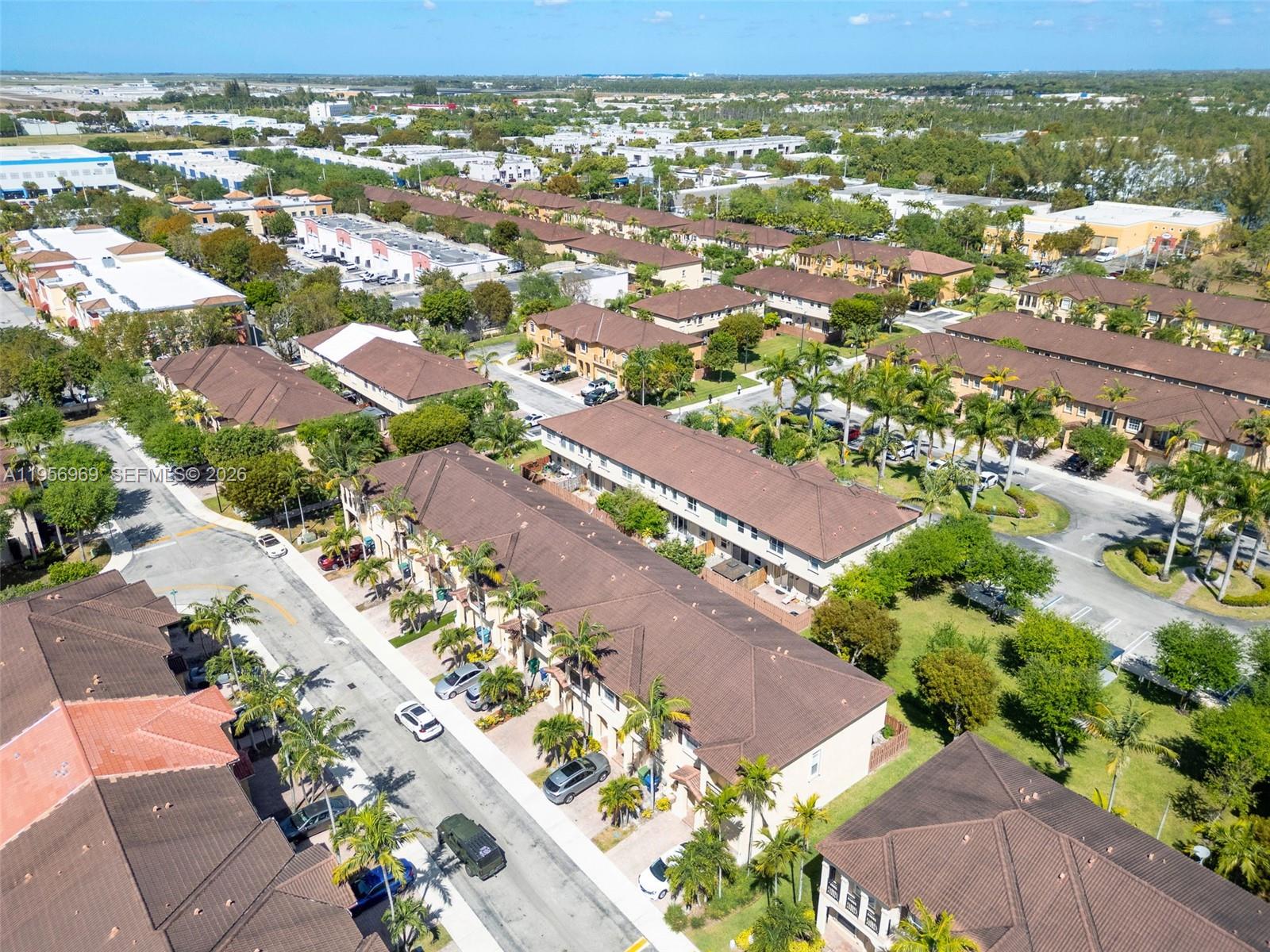 12965 Southwest 133rd Terrace Miami, FL 33186 - Photo 36 of 42 an aerial view of residential houses with outdoor space